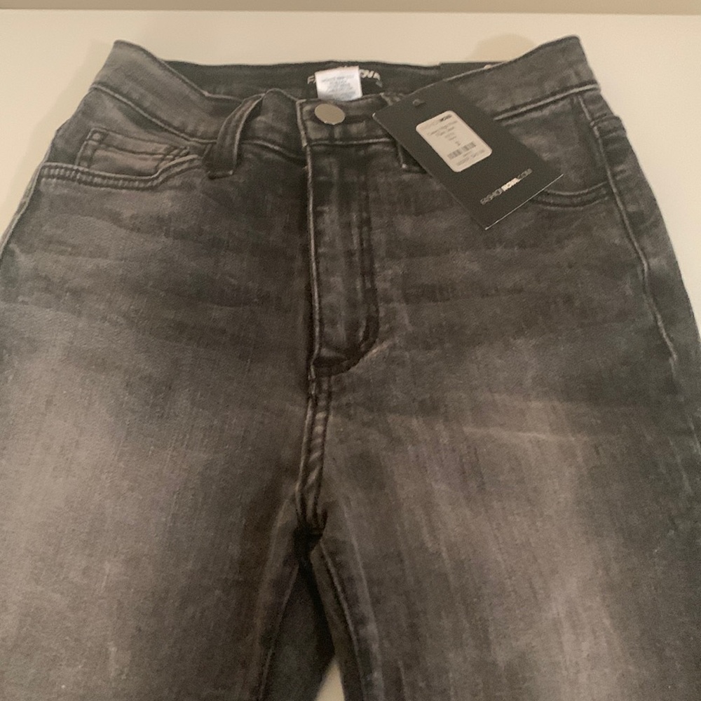 Brand new, never worn fashion Nova stretch denim flare leg jeans